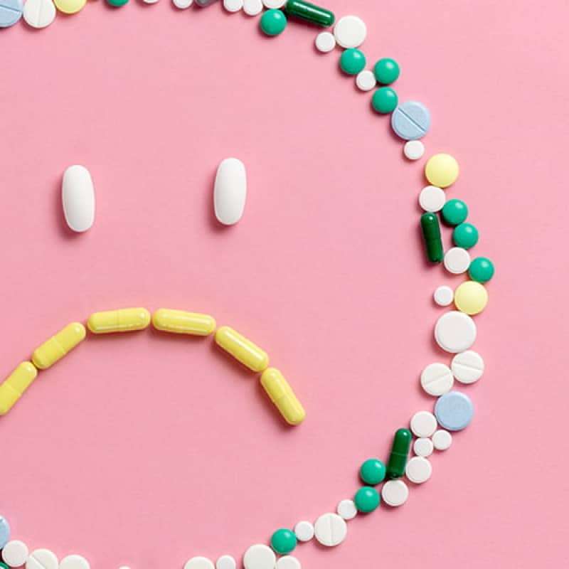 The pill and depression, Sad face made out of pills | e-Surgery