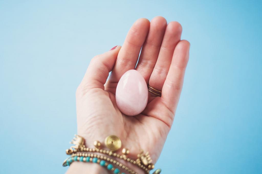 Female hand with bracelets on the wrist holding a jade crystal egg  | What is Bacterial Vaginosis? And Why Do Women Keep it a Secret? | e-Surgery