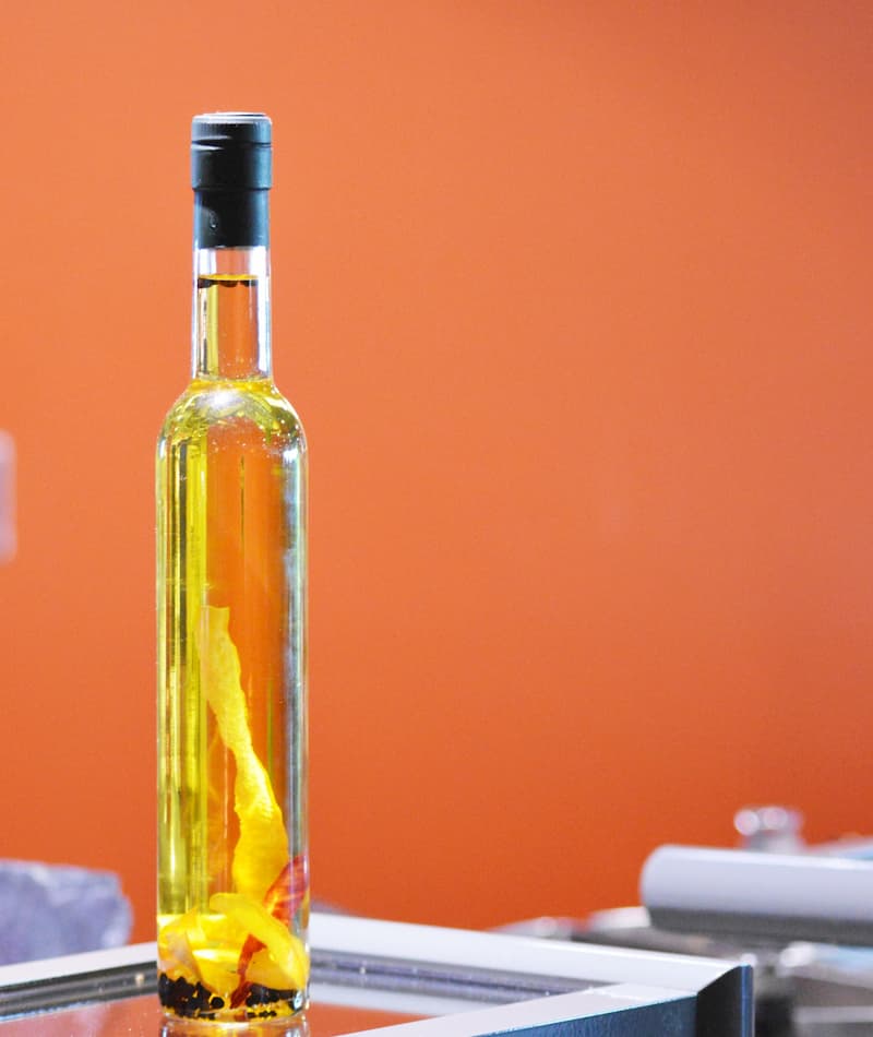 Bottle of olive oil, reducing unhealthy fats can reduce cholesterol, e-Surgery