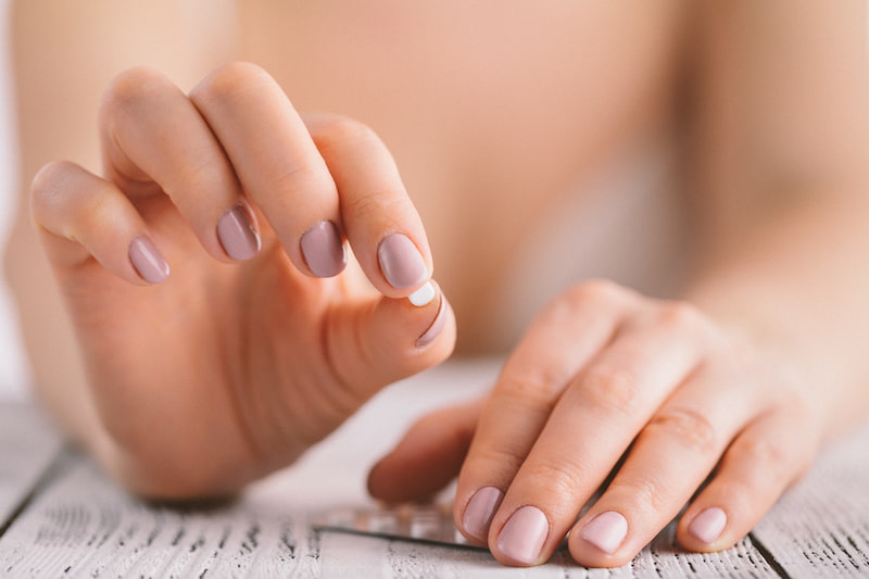 woman debating to come off the pill