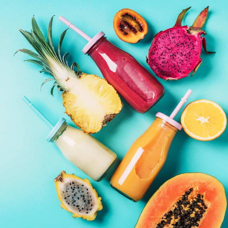 collecvtion of smoothies and fruits. 5 ways to stay hydrated this summer | e-Surgery