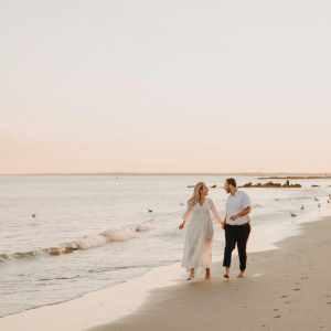 A couple walking on the beach