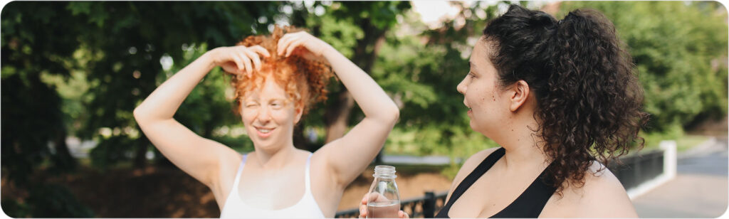 Two women jogging in a park