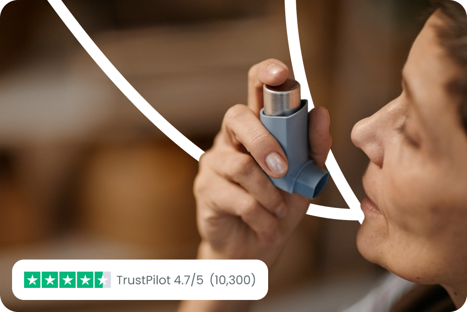 woman using asthma reliever inhaler