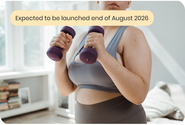 Woman holding weights indoor